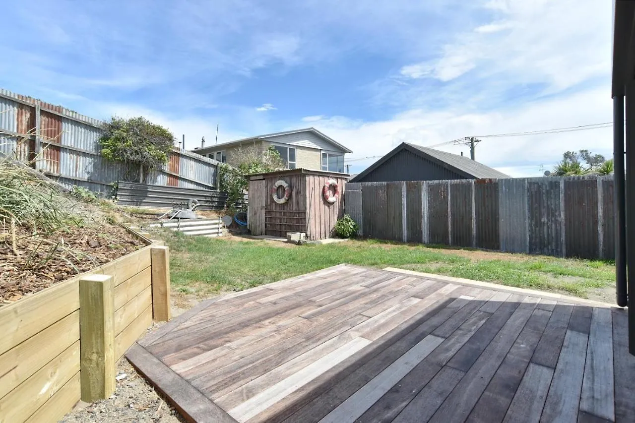Beachfront Bach - Christchurch Holiday Homes
